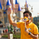 A cast member greets guests during the reopening of Walt Disney World on July 11.